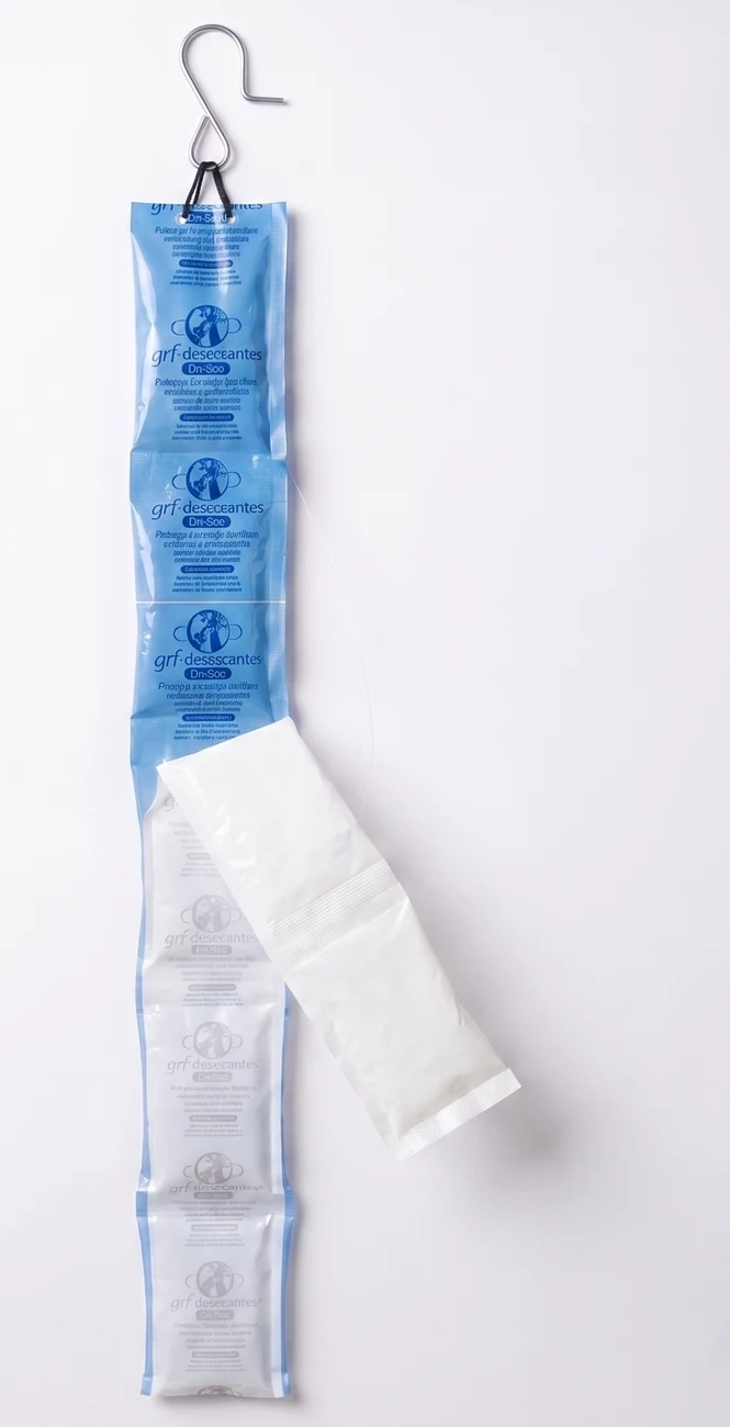 Self-adhesive Dry Box strip with the adhesive liner being peeled off